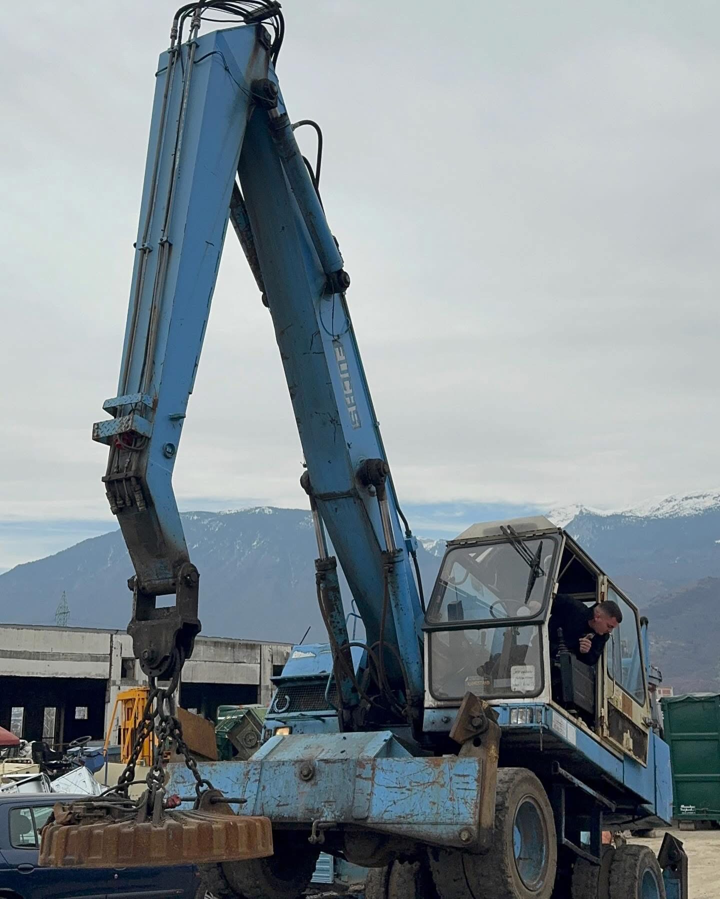 Blue excavator operations